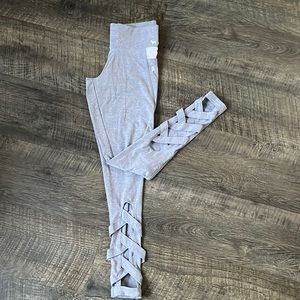 Pink yoga pants. Braided back.